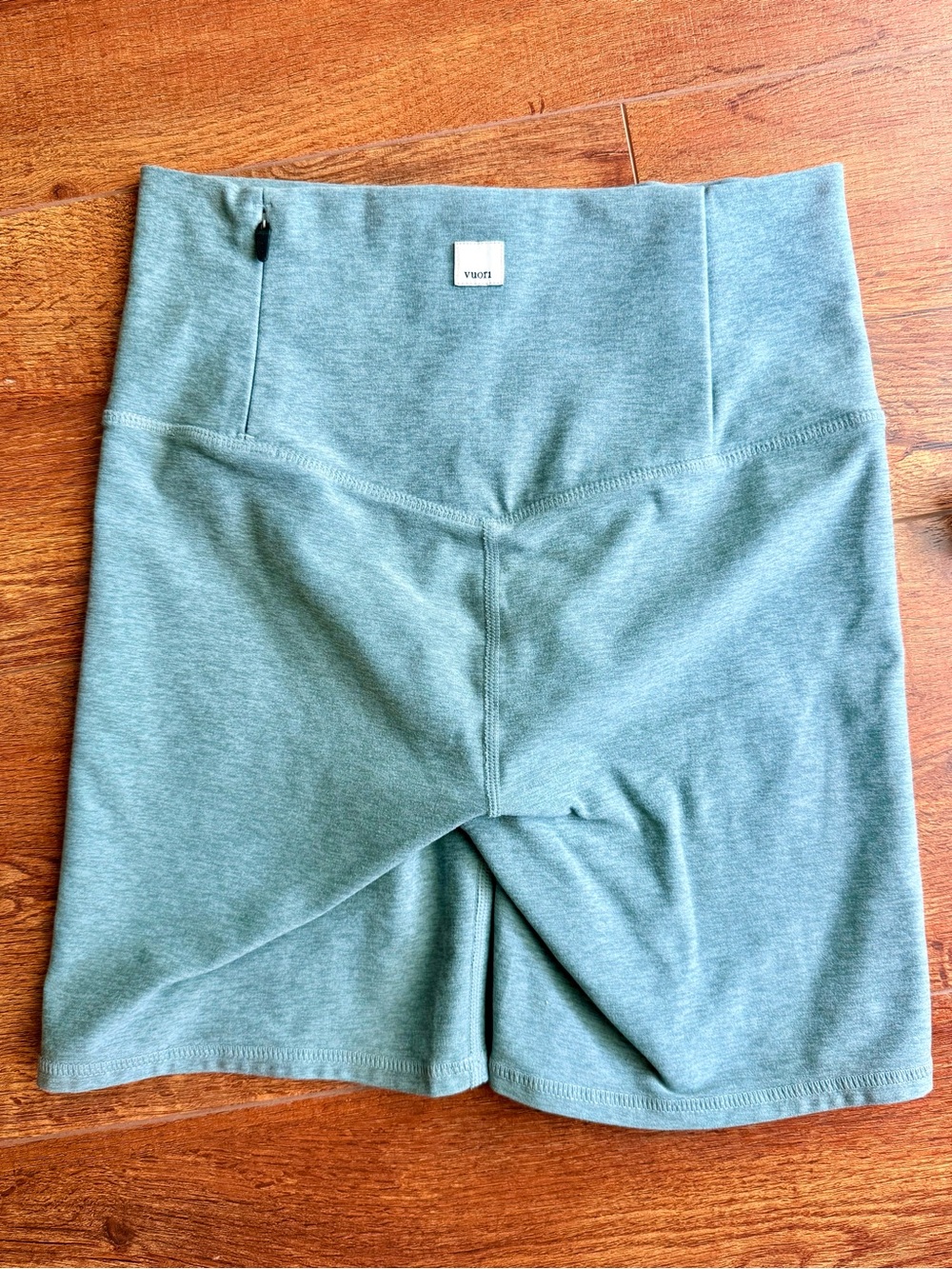 Vuori Workout High-Waist Athletic Biker Shorts in Sage Green